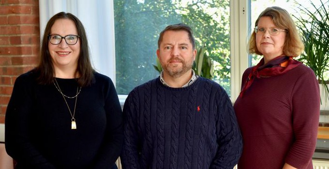 Gruppbild tre forskare på FHS.