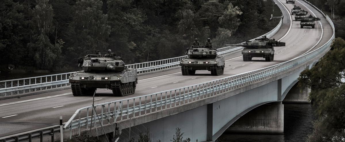 Armored combat vehicle on a rural road