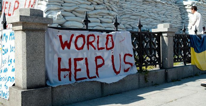 Plakat vid en demonstration mot kriget i Ukraina.